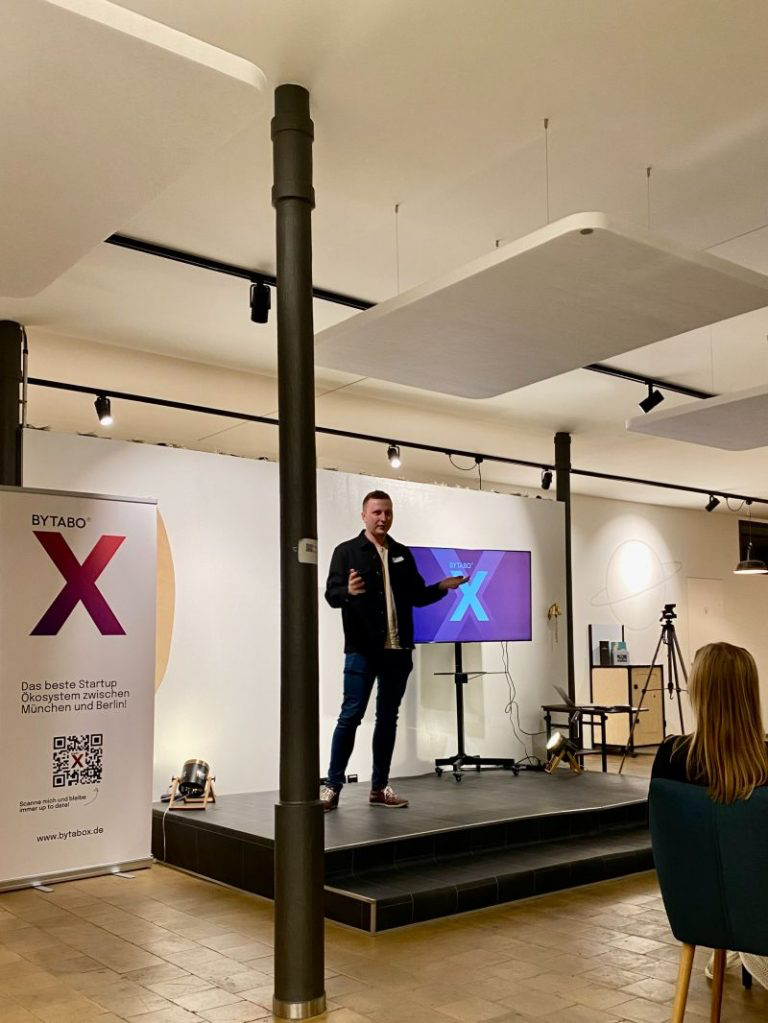 stefan presenting on a small stage